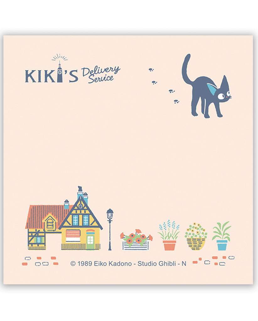 One of the pages from the Kiki's Delivery Service memo pad featuring Jiji the cat as well as a home and flowers. 