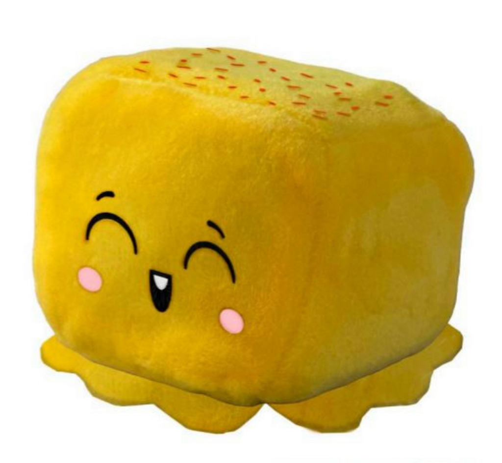 Close up picture  yellow plush, Ice Cream squishy toy with a cute expression on it's face. 