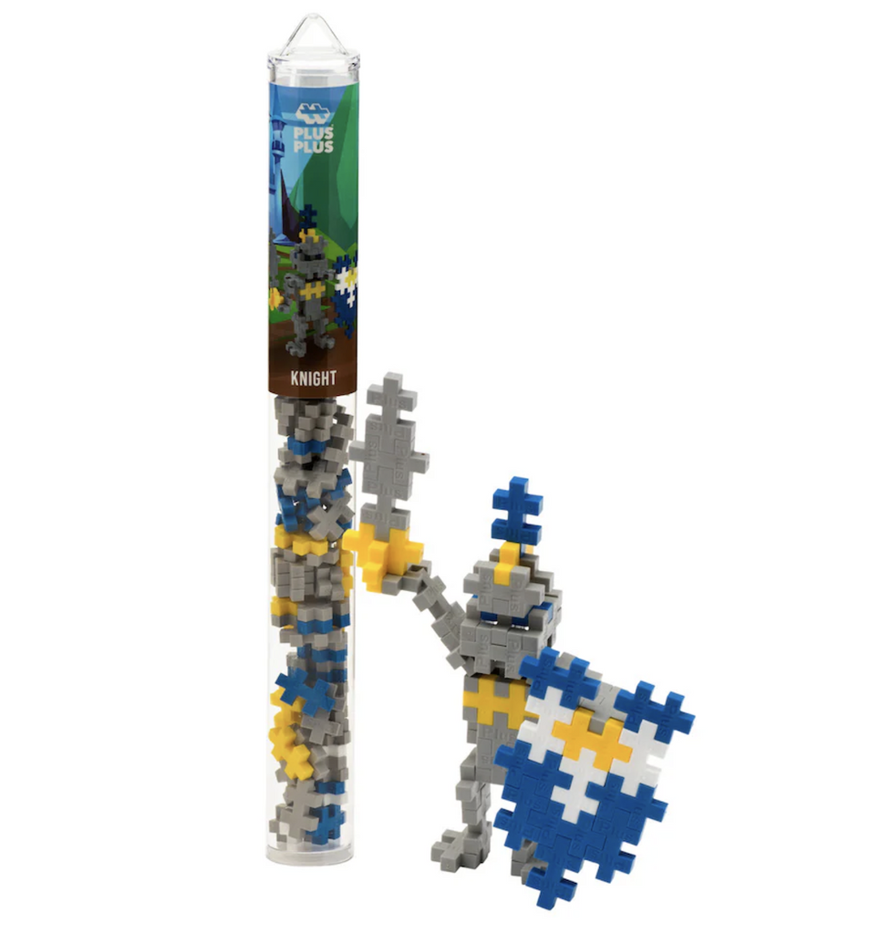 Plus Plus 70 Piece Knight tube with a knight holding a shield and sword built from the set. 