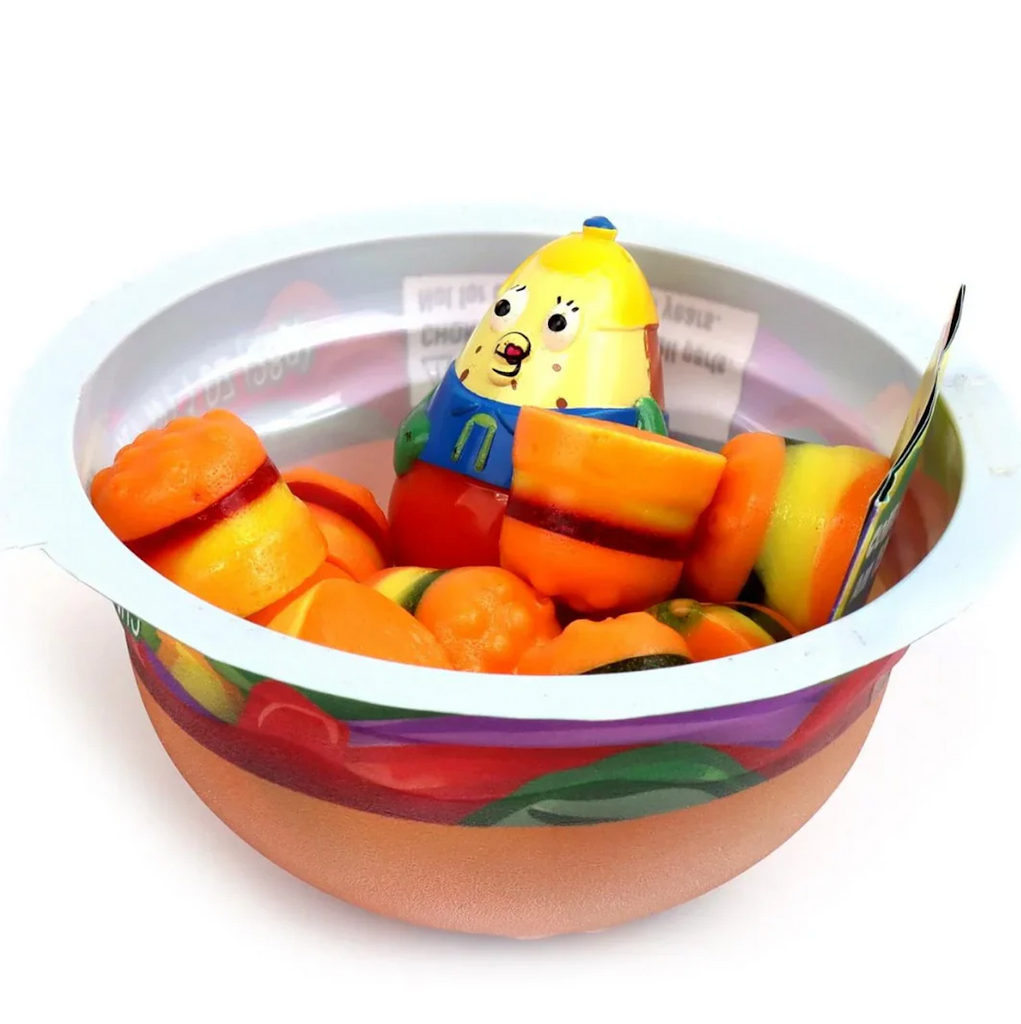 Bottom half of the Krabby Patties burger container with mini gummy burgers and a mini toy figure. 