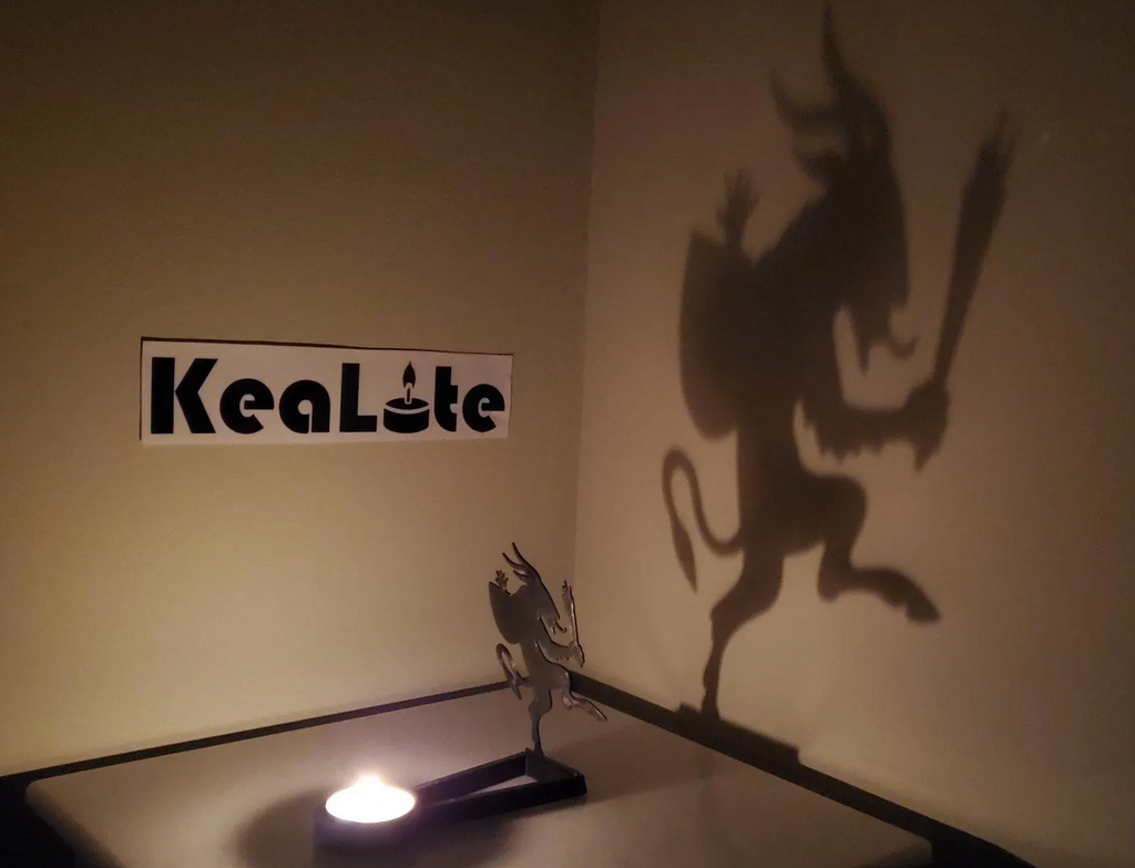 Kealite Krampus Shadow Caster projecting the shadow of Krampus creeping along looking for ungrateful children. 