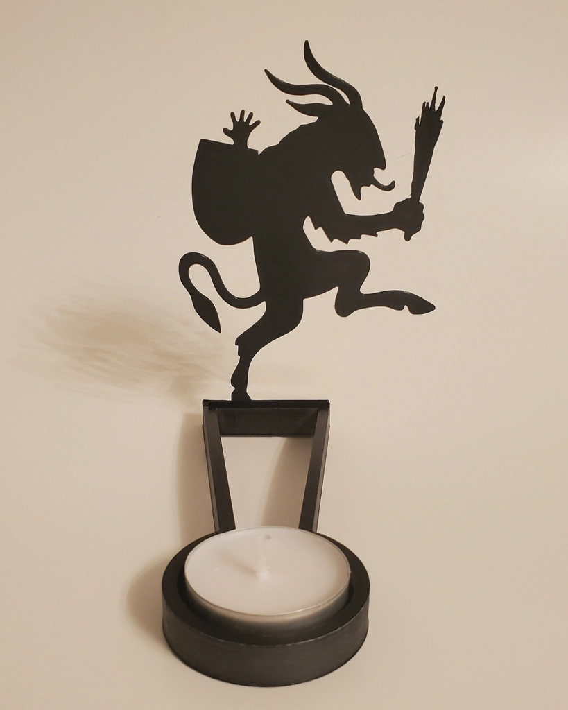 Krampus Shadow Caster with a tea light. 