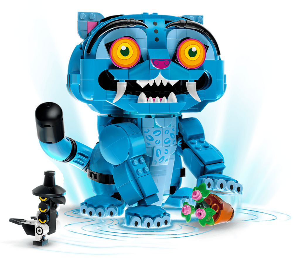 LEGO Derpy tiger constructed and posed to be knocking over the flowerpot with his goofy grin and Sussie bird off to his side. 