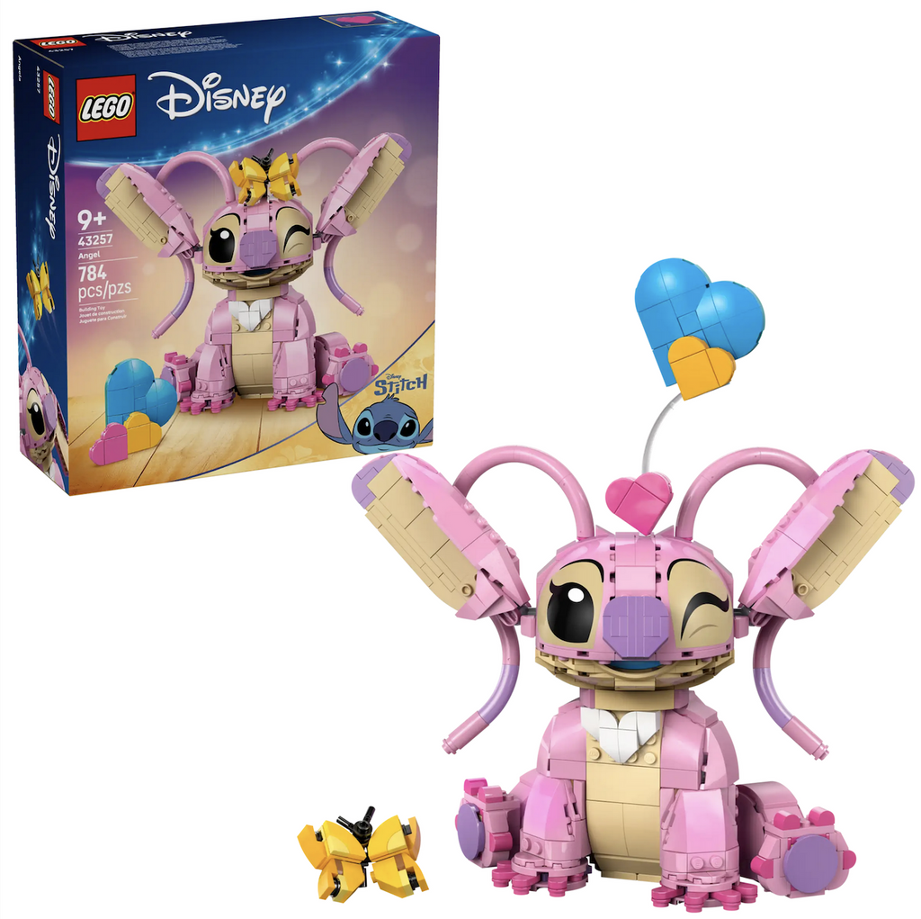 LEGO Disney Angel character from the Lilo & Stitch tv series. Angel is a pink creature with heart shaped accessories and a butterfly accessory. She fully built in a sitting position with the colorful LEGO box behind her. 