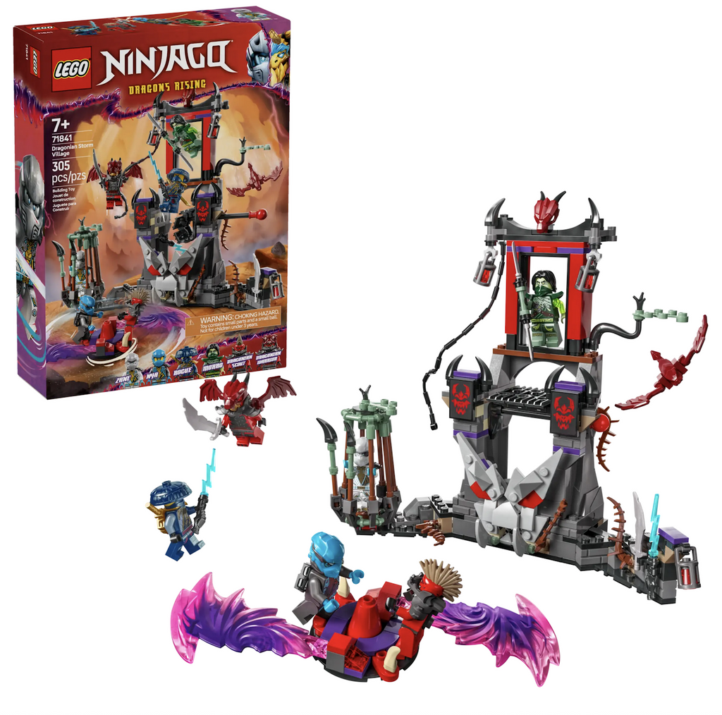 The LEGO Ninjago Dragonin Storm Village set with The Dragonians’ hideout that includes a cage to detain ninja characters, a retractable bridge, a pit with for the ninja to fall into with a skeleton, a climbing rope so the ninja can escape and a spinner toy with space for 2 characters to sit inside all built and set up in front of the red product box. 