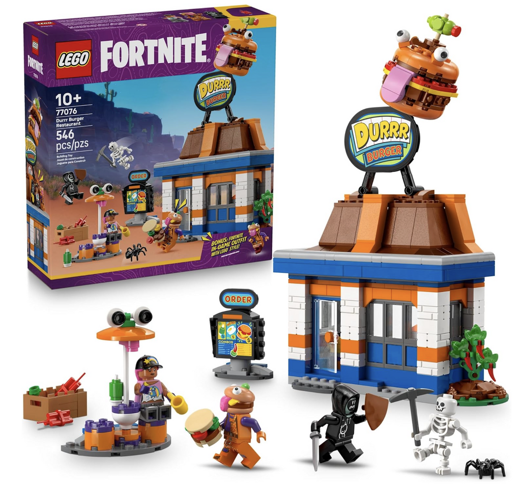LEGO Fortnite play set of the Durrr Burger restaurant model with a condiment station, a soda machine and a cash register, and outside they’ll find a seating area that includes a cup and a fried egg. There’s also a removable attic that includes a spider figure. All this is set up in front of the LEGO box it comes packaged in with pictures of the model and minifigures. 