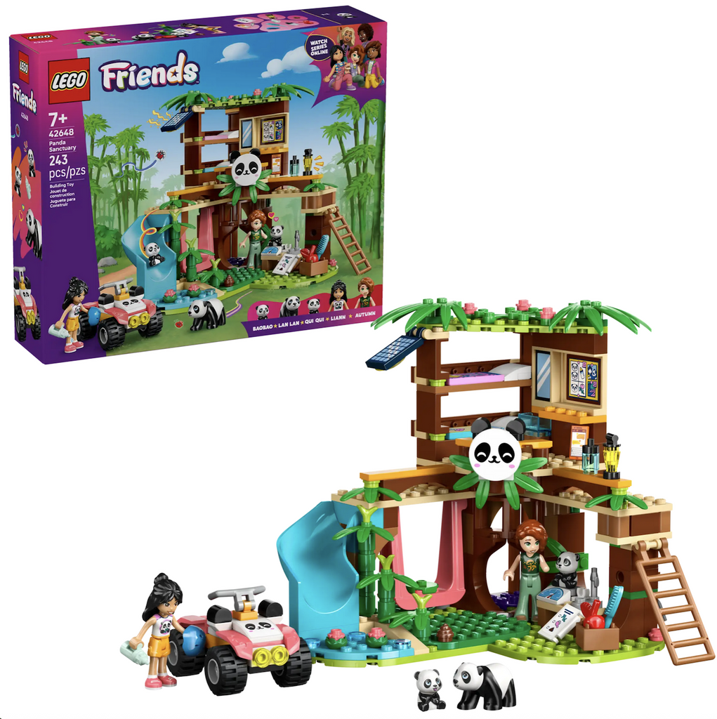 The LEGO Friends Panda Sanctuary Animal Care set assembled and set up in front of the purple box. The set has a slide for the pandas and a swing. At the top of the tree house there are two bunk beds and there is an ATV vehicle the characters ride around on. 