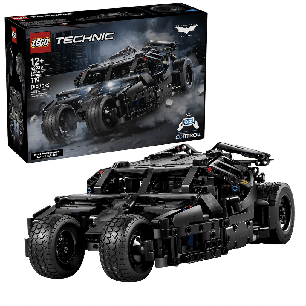 The LEGO Batmobile Tumbler RC car fully built and parked in the foreground with the black box that features a picture o the Batmobile all lit up on the front. 