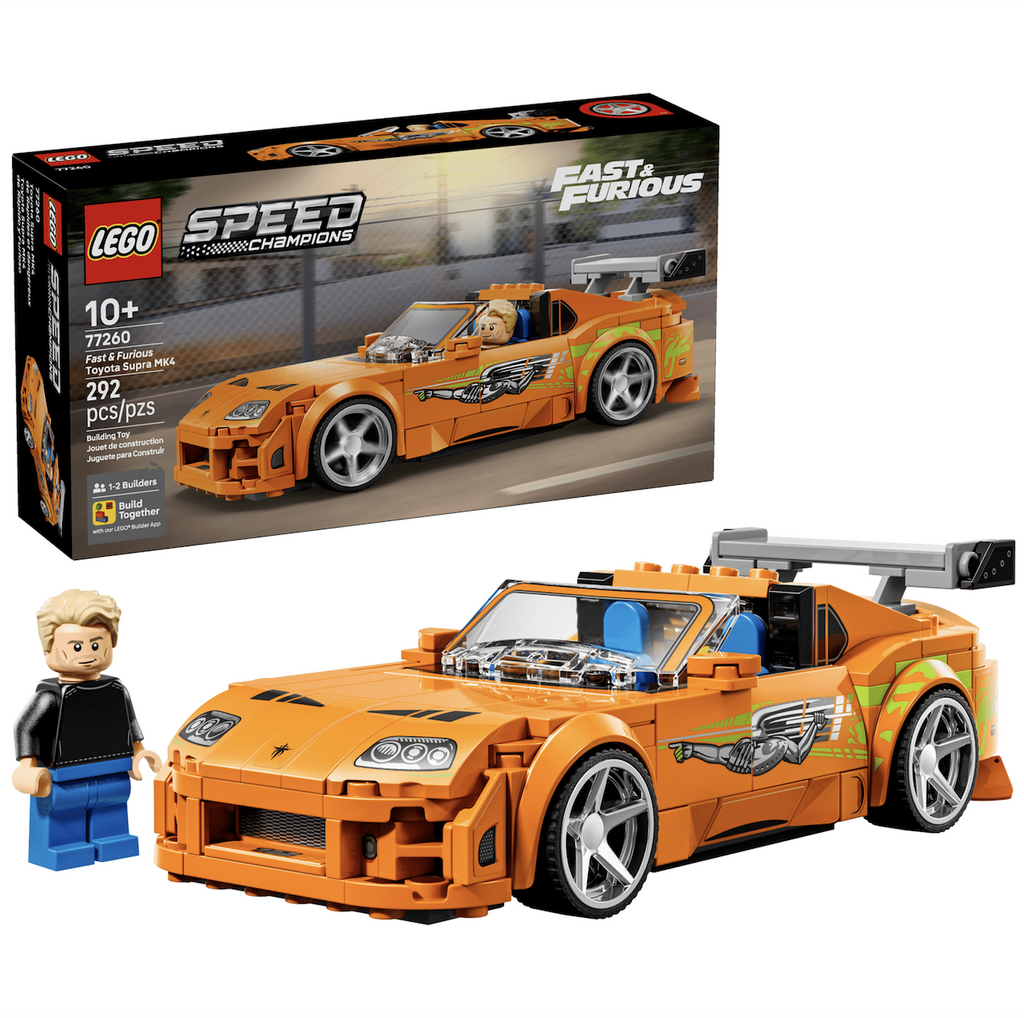 LEGO Speed Champions Fast and Furious Toyota Supra MK4 model with  Brian O’Conner minifigure character built and set up in front of the box that it comes packaged in. 