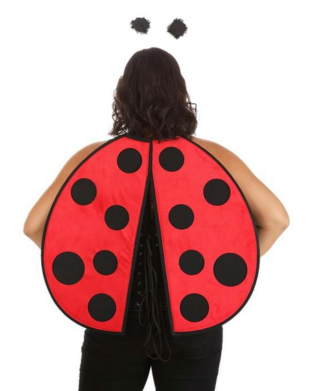 Rear view of the ladybug red velour wings with symmetrical cutout black spots and fabric-wrapped headband with attached antennae made from springy wire coils with fluffy feather tops being worn by an adult.