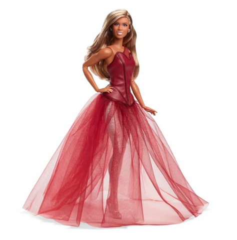 The Barbie Tribute Collection celebrates award-winning actress, producer, writer and advocate Laverne Cox. The Laverne Cox Barbie doll dazzles in a triple-threat ensemble featuring a deep red tulle gown gracefully draped over a silver metallic bodysuit. Her hair is swept into glamorous Hollywood waves while dramatic makeup completes her look. This collectible Laverne Cox Barbie doll is sculpted to her likeness and features articulation for endless posing possibilities. 