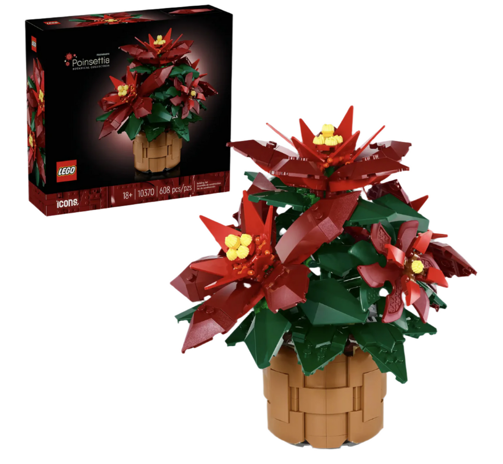 LEGO Icons Poinsettia built and in the forefront with the box in the background with a picture of the completed build on the front. 