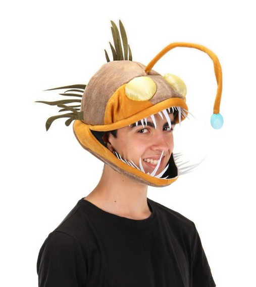 Light-up Anglerfish Jawesome Hat! Featuring a faux suede outer shell, with felt teeth and fins that give it a realistic and menacing angler fish look. Also has a light-up bendable lure. Shown here being worn by an adult. 