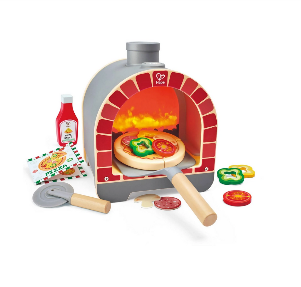 Light and Sizzle toy pizza oven with a pizza inside, surrounded by toy pizza toppings, bottle of pizza sauce, and pizza cutter. 