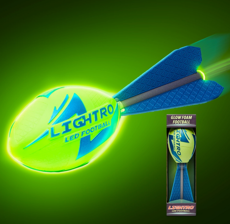 The Lightro Glow Football lit up and flying through the air. 