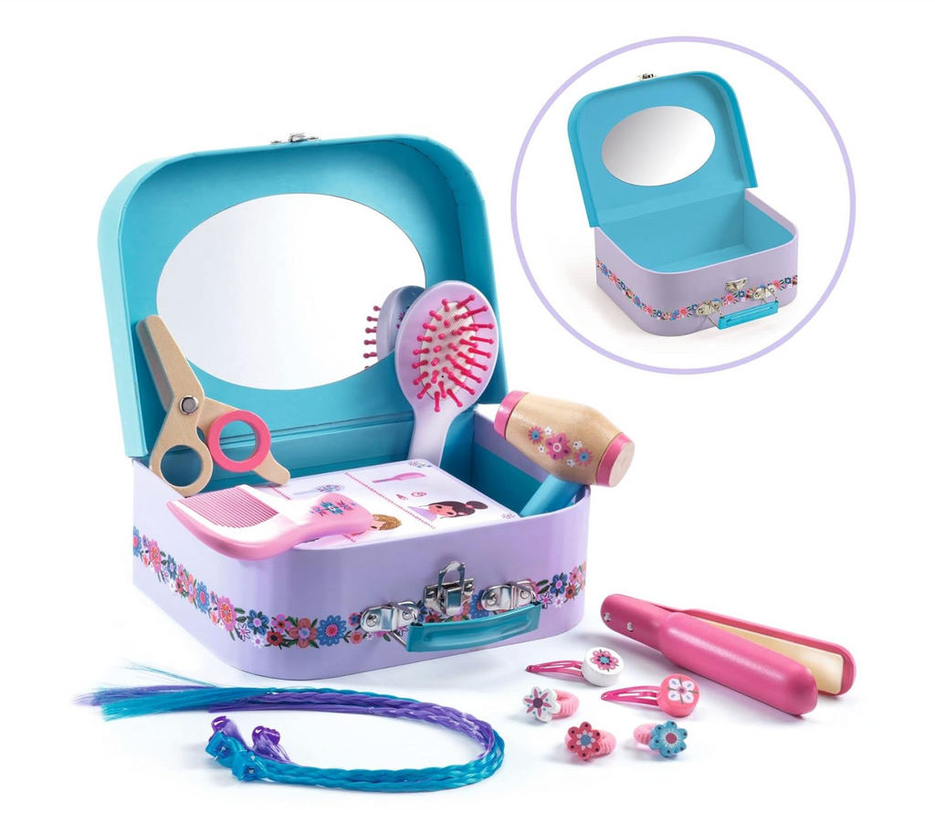 Children's toy hair styling set with case and mirror, scissors, hair dryer, brush, barrettes, and other tools. 