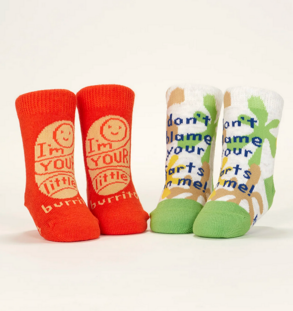 Each pair of baby socks displayed on mannequin feet. One pair is red and reads "I'm Your Little Burrito" and the other is grey with blue and green that read" Don't Blame Your Farts On Me"