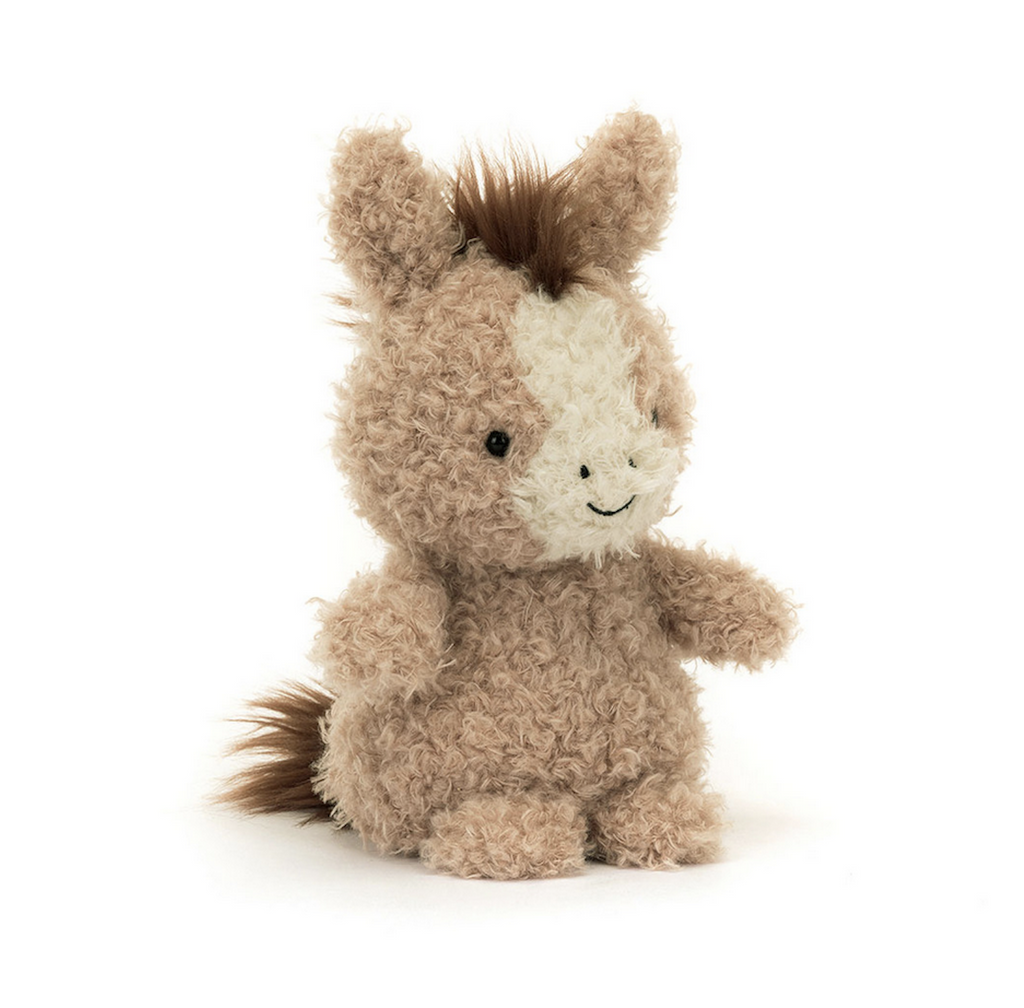Little orse plush with scruffy fur and spiky, brown mane. 