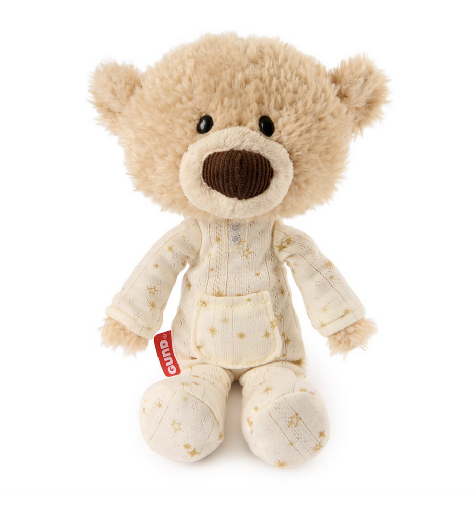 Little Toothpick Bear wearing a gold-star-patterned, pointelle-knit pajama onesie with a pocket to hold a small note or baby tooth. 