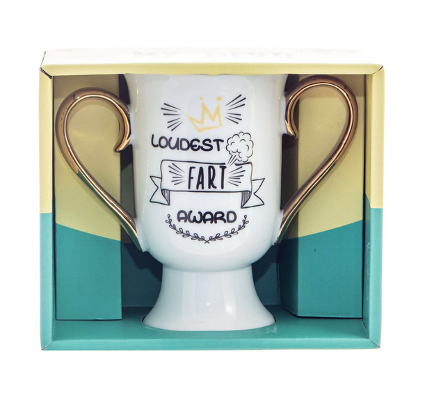 The "Loudest Fart Award" trophy mug packaged in a yellow and green box.