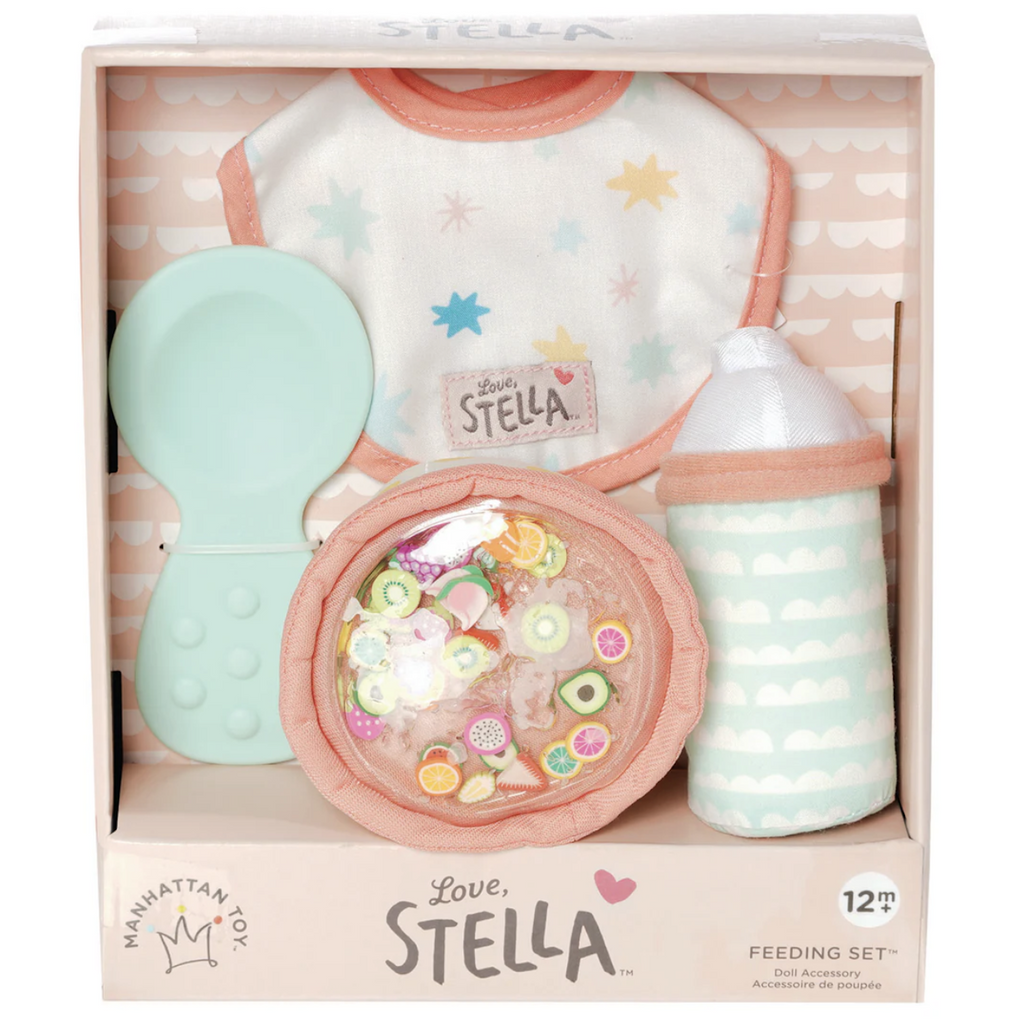 The Love, Stella Feeding Set packaged in a box with the front open so the plush bottle and bowl can be felt as well as the silicone spoon and bib. 
