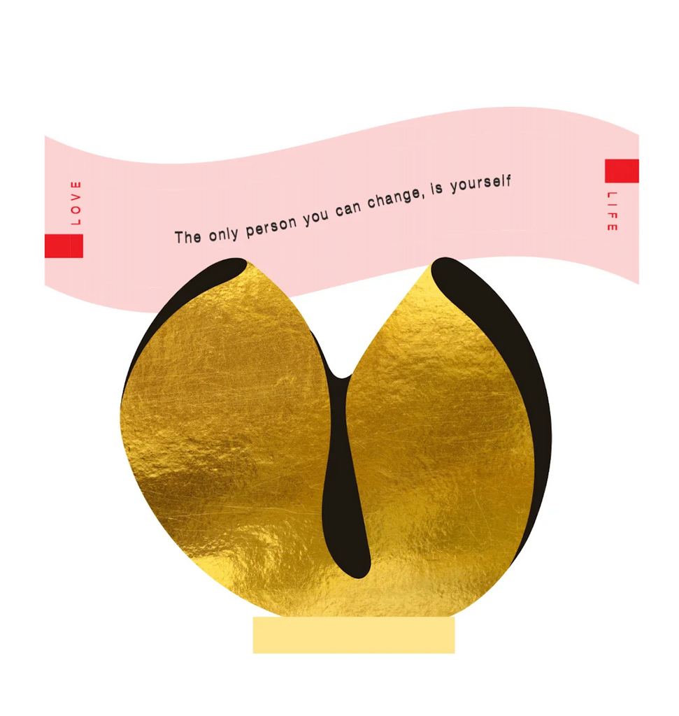 Gold fortune cookie shaped stand that holds the daily fortunes in the Love and Fortune kit. 