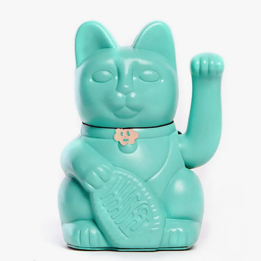 Aquamarine Lucky Cat statue with waving arm and holding a banner that translates to "Good Luck"