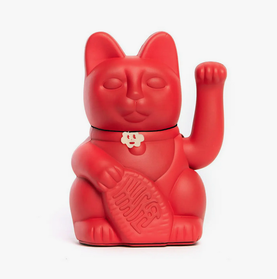 Red Lucky Cat statue with waving arm and charm necklace. The good fortune cat is holding a banner that translates to "Good Luck"