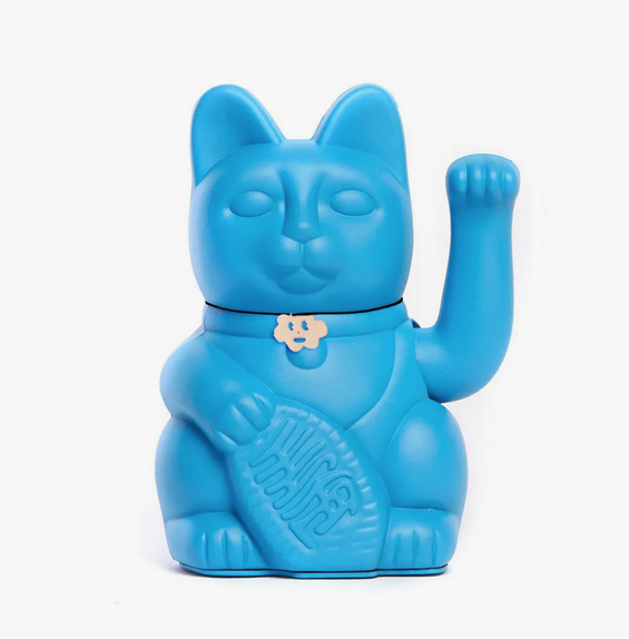 Bright blue Lucky Cat statue with waving arm and holding a banner that translates to "Good Luck"