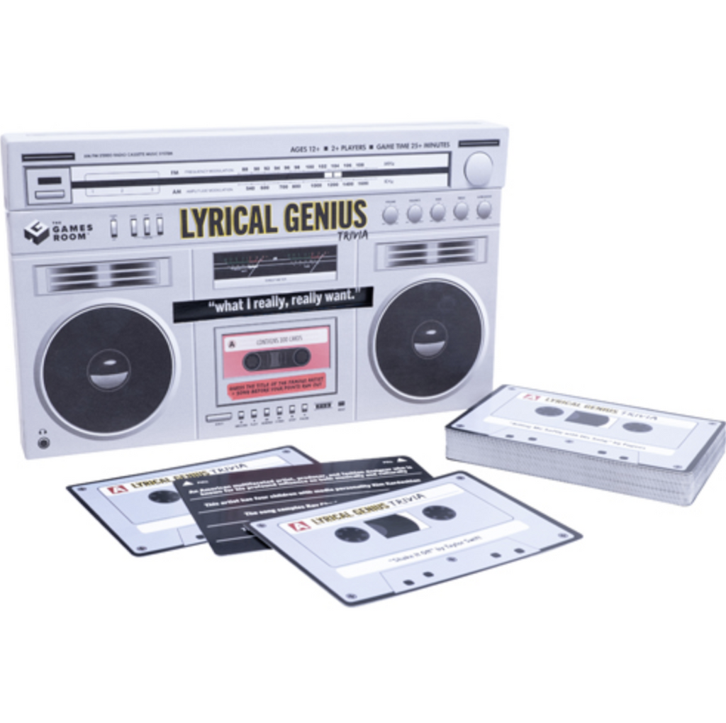 Game box for Lyrical Genius game that i shaped like a retro AM/FM boombox with cassette player. There are cards from the game laid out in front of the box that look like cassette tapes. 