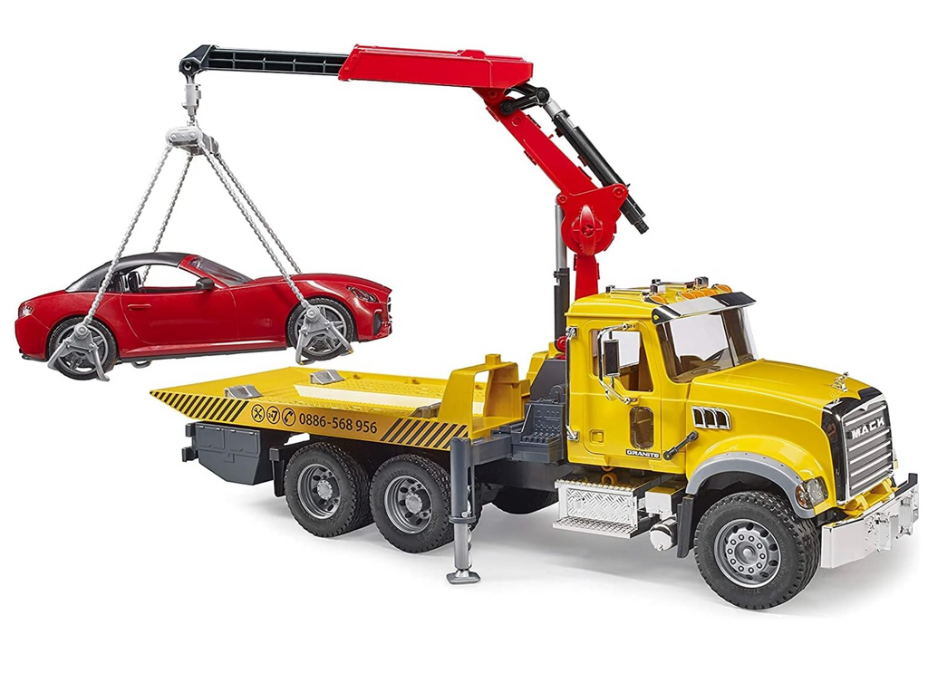 The yellow Mack Granite Tow truck lifting the red Roadster vehicle in it's crane. Toy truck by Bruder. 