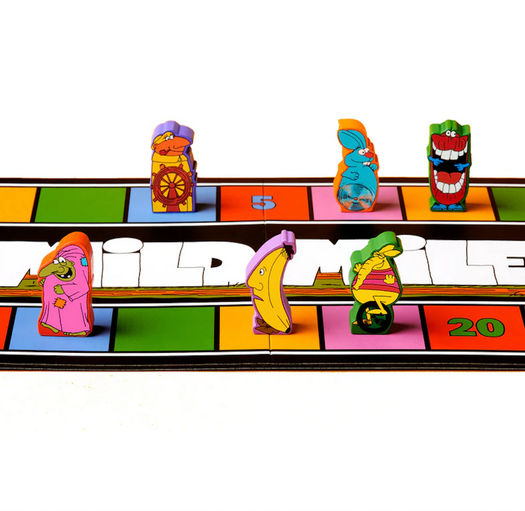 A colorful board game featuring cartoon animal characters standing on a multi-colored track with large white text reading 'WILD MILE' across the middle. 