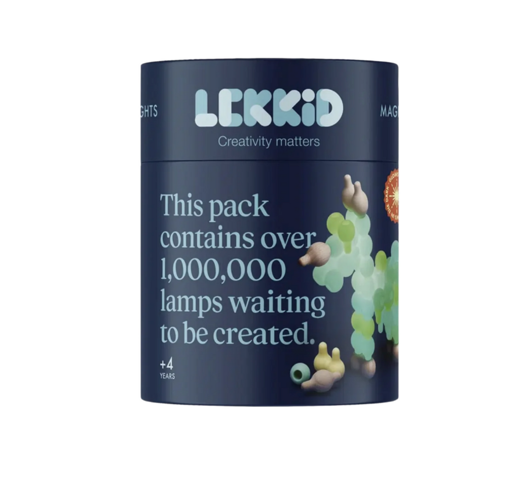 Magical Lights by Lekkid container is dark blue with light blue text that reads This pack contains over 1,000,000 lamps waiting to be created. Ages 4 & up. Image of glow in the dark lamp built in the background.