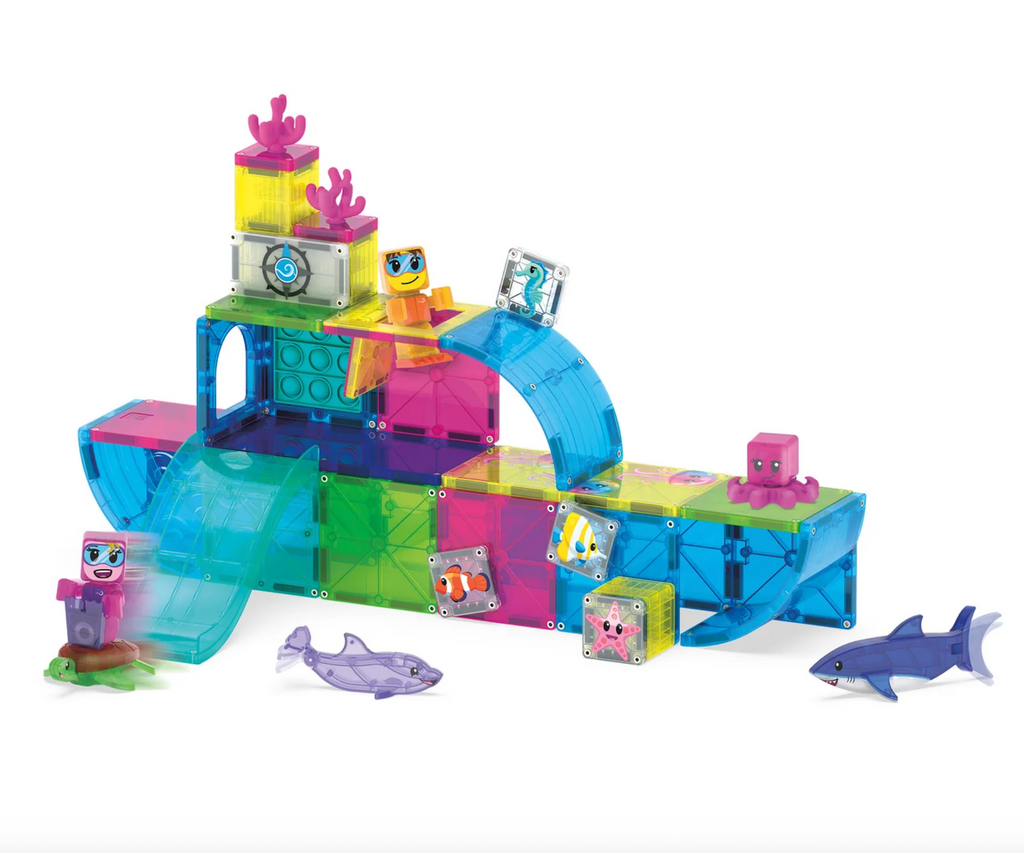 The Undersea Adventure Magna Tiles set pieced together to form a ship with dolphins, sharks, fish and deep sea divers. 