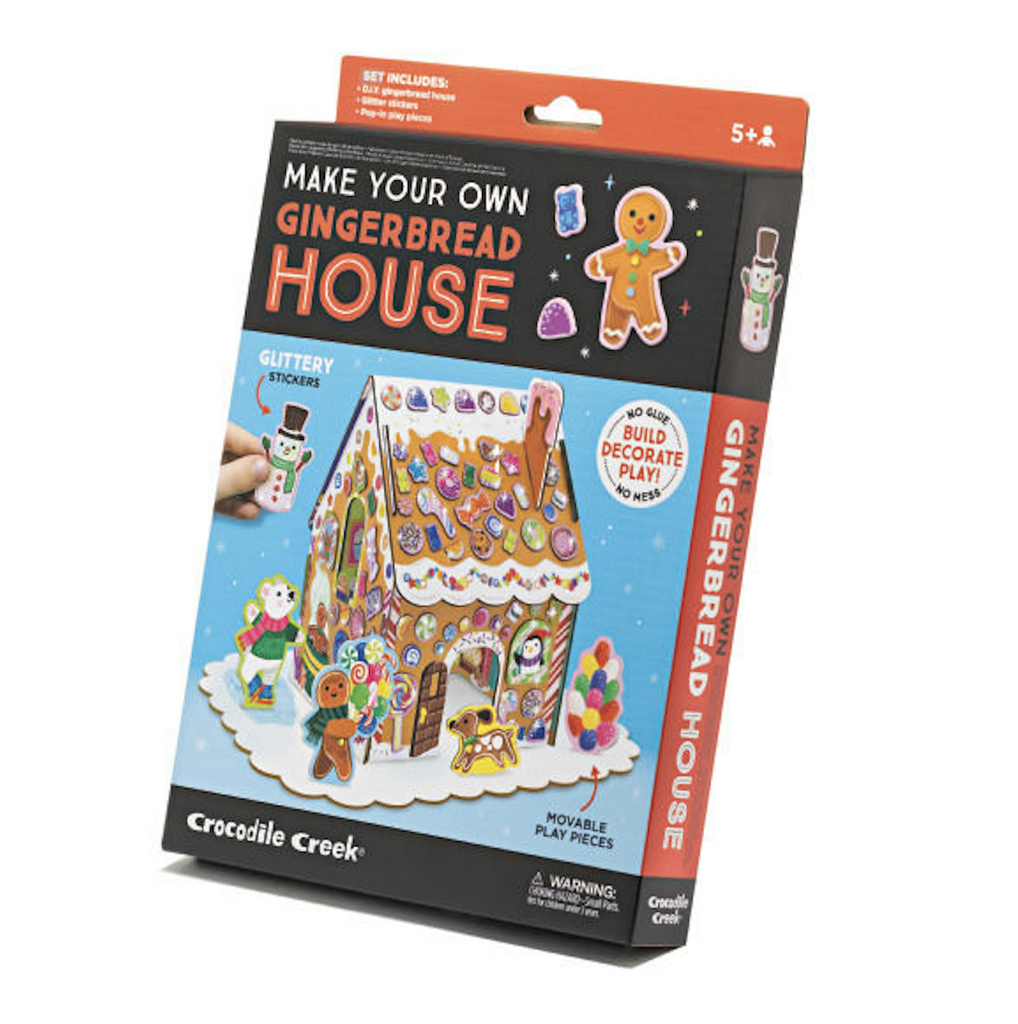 The Make Your Own Gingerbread House packaged in a black and orange box with a picture of the gingerbread constructed with glittery stickers decorating the roof and front of house. 