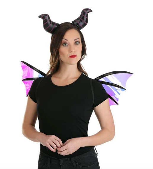 Maleficent Dragon Horns Headband & Wings Accessory Kit. The stuffed horns slide over fabric-covered plastic headband and the horns have printed spirals. Wings have elastic shoulder straps. Shown here being worn by an adult. 