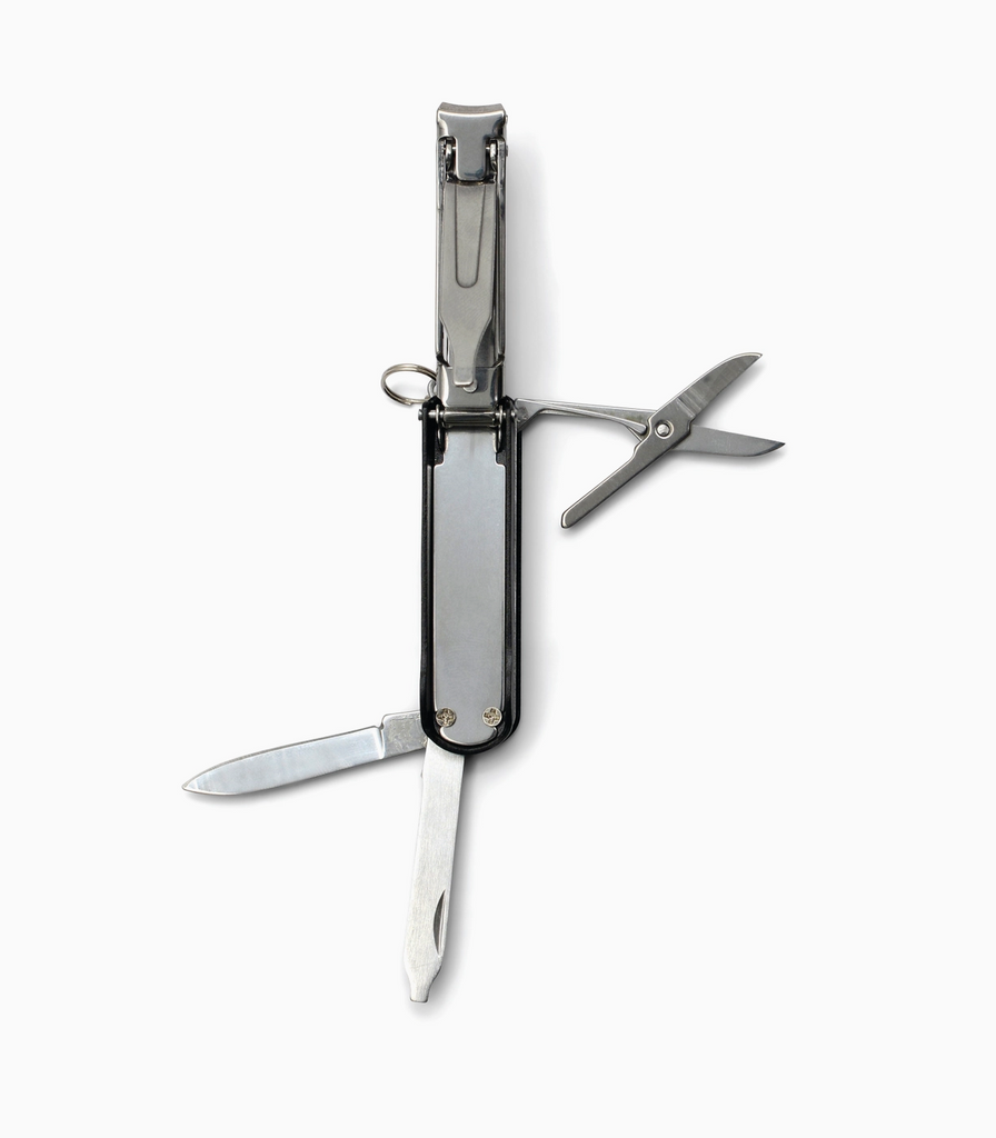 The Manicure Multi Tool with each tool extended.