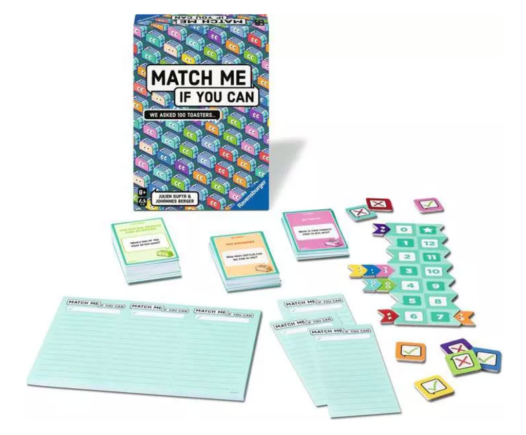 Match Me If You Can game box with the  question cards, score cards and answer tokens all set up and ready to be played. 