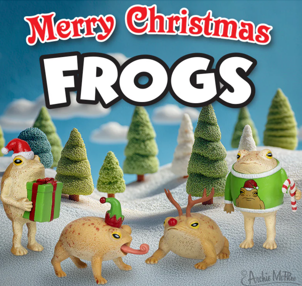 Frogs in Christmas-themed outfits with trees and snow in the background