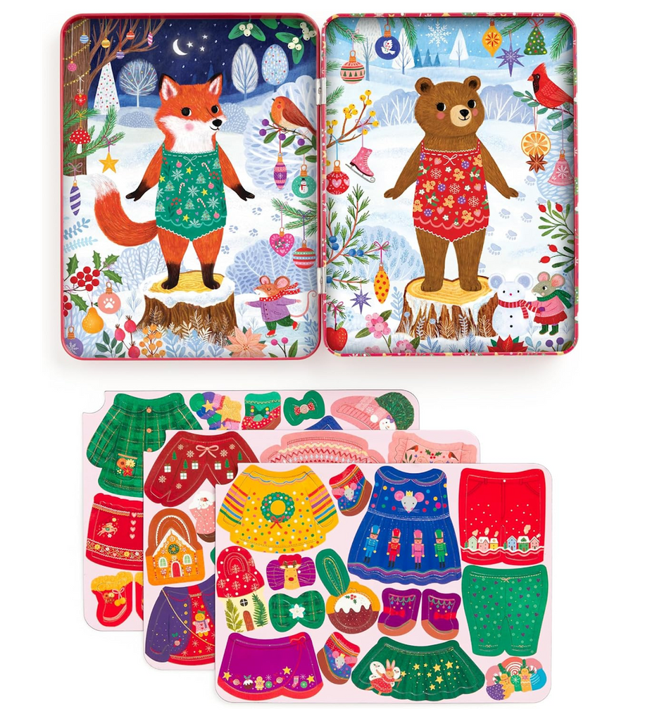 Two magnetic dolls at home in the woodland waiting to be dressed with the 3 sheets of holiday clothes and accessories. 