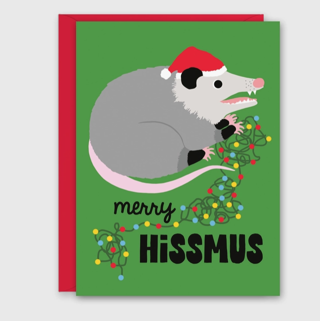 Holiday card with an illustrated possum wearing a Santa hat chewing on a string of Christmas lights that reads "Merry Hissmus"