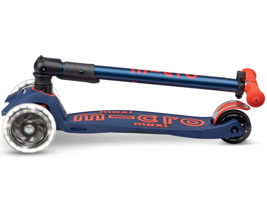 Blue scooter with red handlebars and lettering with the T-bar folded down over the kickboard. 