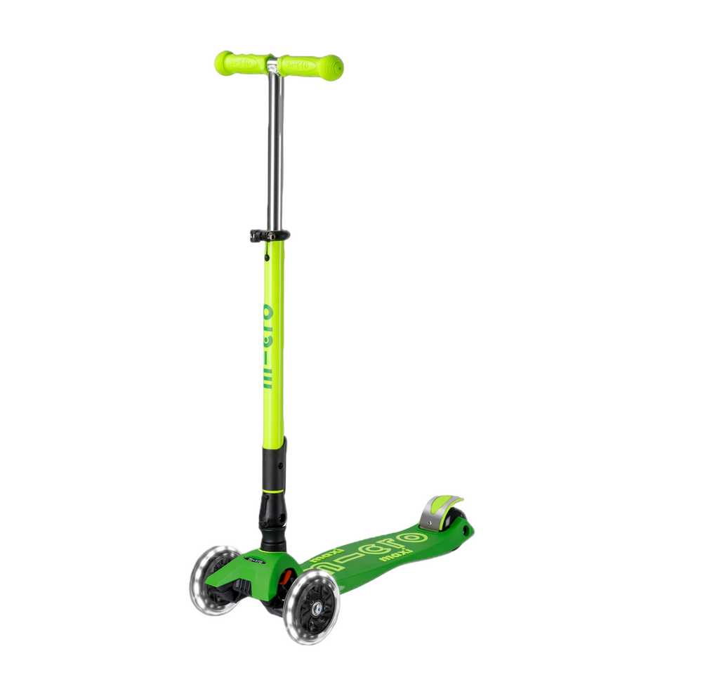 Light and dark green scooter with light up LED wheels. 
