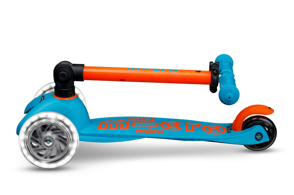 The Micro Mini Foldable LED Scooter with the T bar handle bar folded down. 