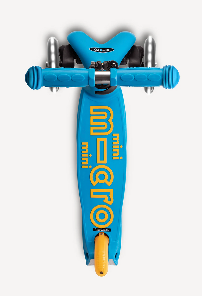 The Micro Mini Foldable LED Scooter in Ocean Blue with yellow accents on the deck and wheel covers. 