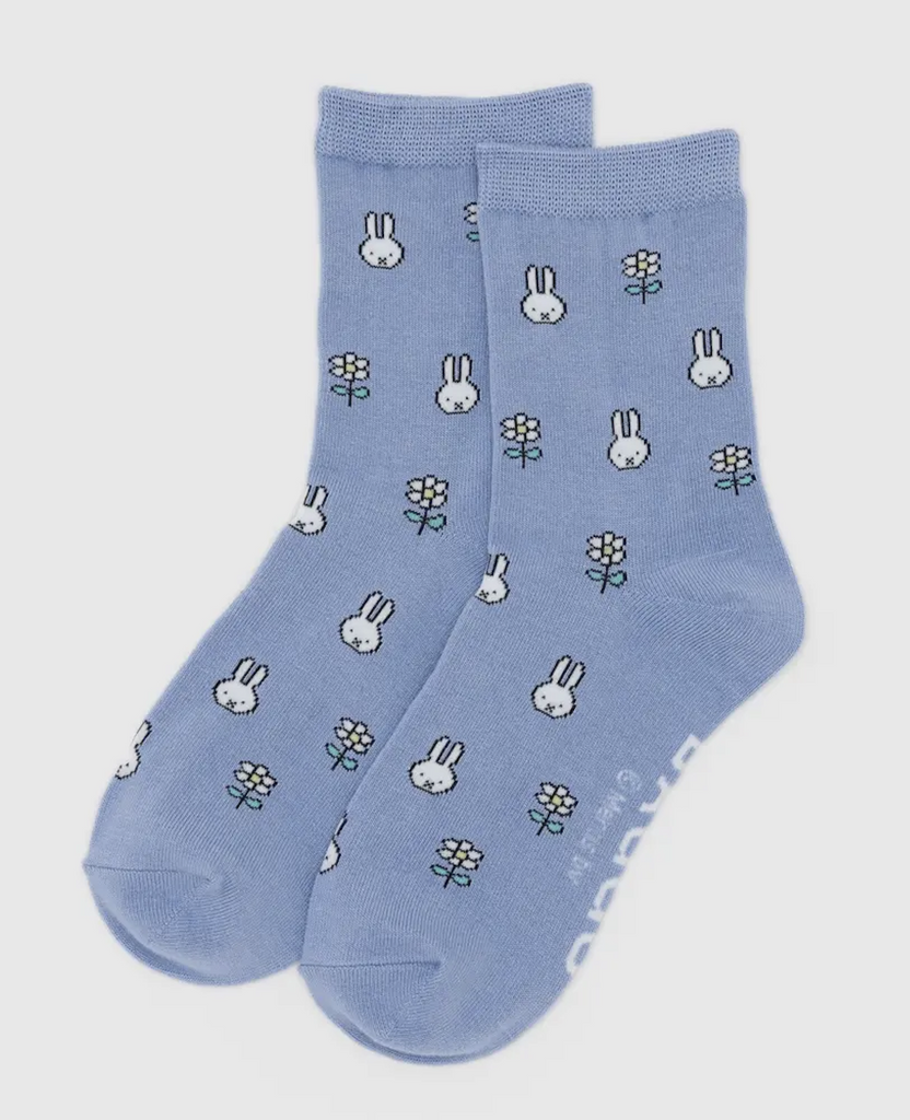  pair of blue socks with a Miffy and flowers pattern. 