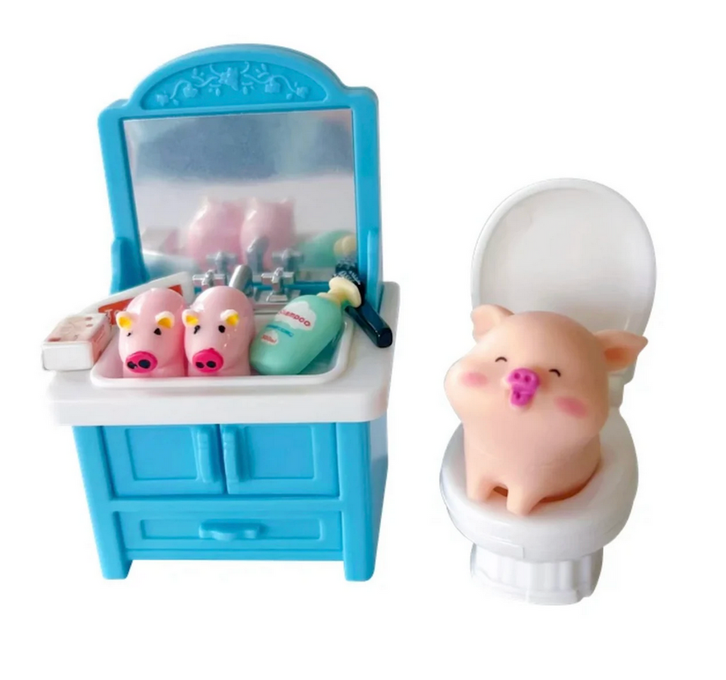 The Mini Piggy Palz with the toy potty and bathroom sink and cabinets filled with mini toy accessories.  