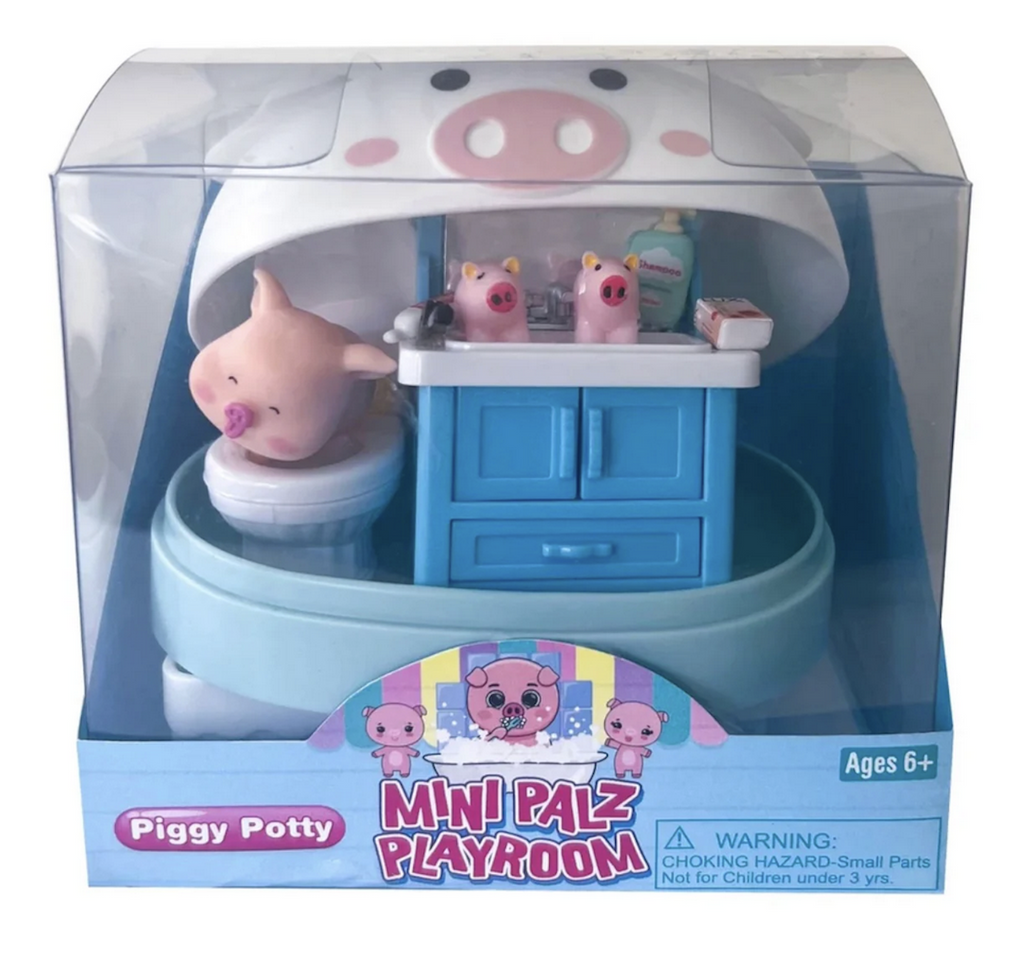 Mini Palz Piggy Potty playset packed in a clear box. The mini piggy pal and accessories are contained in a pig shaped container. 