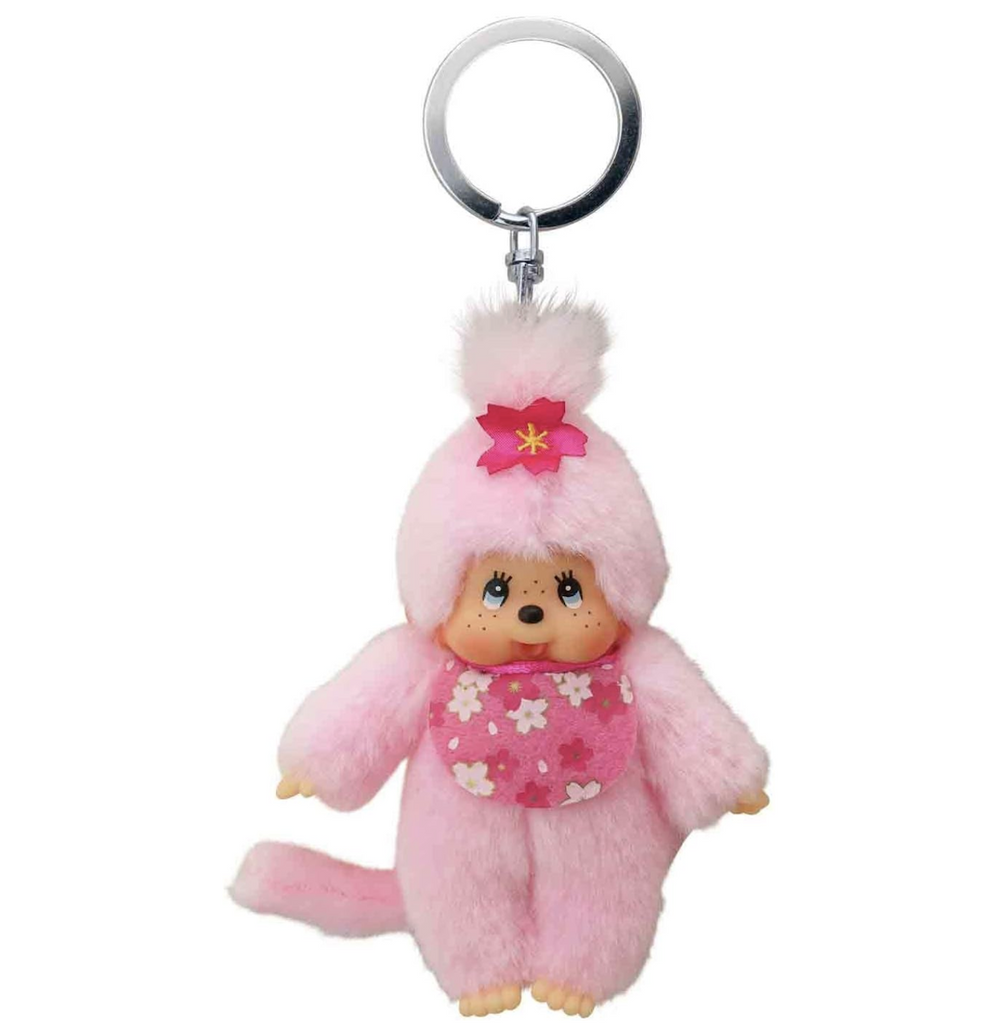 Mini Monchhchi pink plush doll with a cherry blossom bib and flower in her hair. Attached to a silver key ring so she can go anywhere you go!