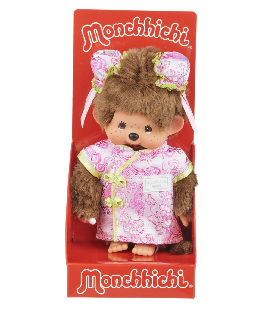 Monchhichi plush doll wearing a traditional chinese pink dress. 